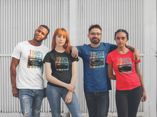 Load image into Gallery viewer, 1990's vintage t-shirt on a group of peoples t-shirts with 1990 and tape in colour