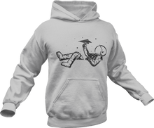 Load image into Gallery viewer, Astronaut playing with paper plane while floating in space printed on a grey hoodie
