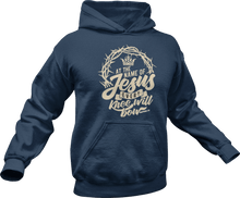 Load image into Gallery viewer, At the name of Jesus every knee will bow printed on a blue hoodie
