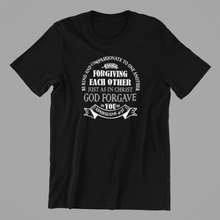 Load image into Gallery viewer, Be kind and compassionate to one another printed on a black t-shirt