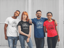 Load image into Gallery viewer, Be kind and compassionate to one another printed on a group of friends t-shirts