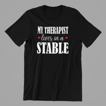 Load image into Gallery viewer, My Therapist lives in a Stable T-shirtafrica, aunt, boy, brother, funny, girl, horse, Ladies, Mens, mom, neice, nephew, pets, sarcastic, Unisex