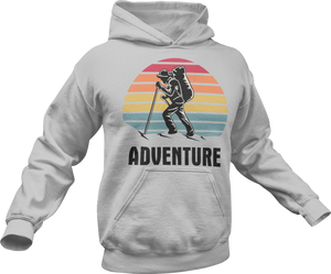 Guy hiking with adventure text printed on a grey hoodie