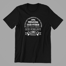 Load image into Gallery viewer, Be kind and compassionate to one another printed on a black t-shirt
