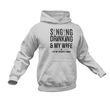 Load image into Gallery viewer, Singing Drinking And My Wife Hoodie
