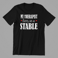 Load image into Gallery viewer, My Therapist lives in a Stable T-shirtafrica, aunt, boy, brother, funny, girl, horse, Ladies, Mens, mom, neice, nephew, pets, sarcastic, Unisex
